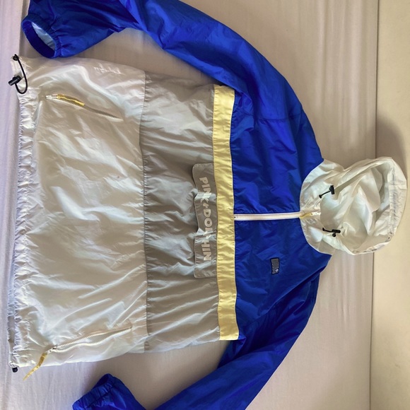 This is a tight fitting, gently used XL Pink+Dolphin Windbreaker. - Picture 5 of 5